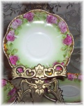 Four  Rose With Gold Trim Saucers